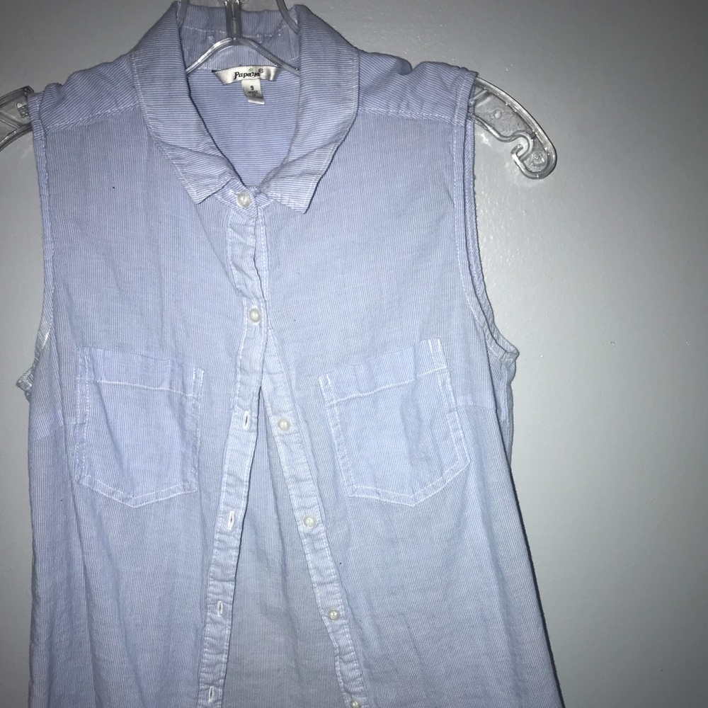 Papaya sleeveless shirt.
